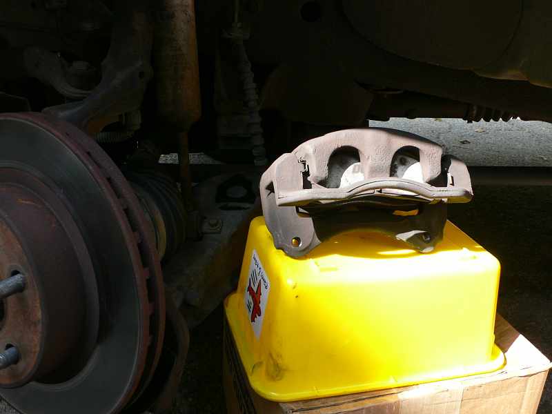 Caliper Removed Resting on Box
