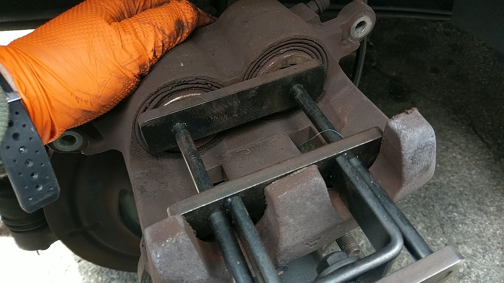 Retract Pistons Into Caliper